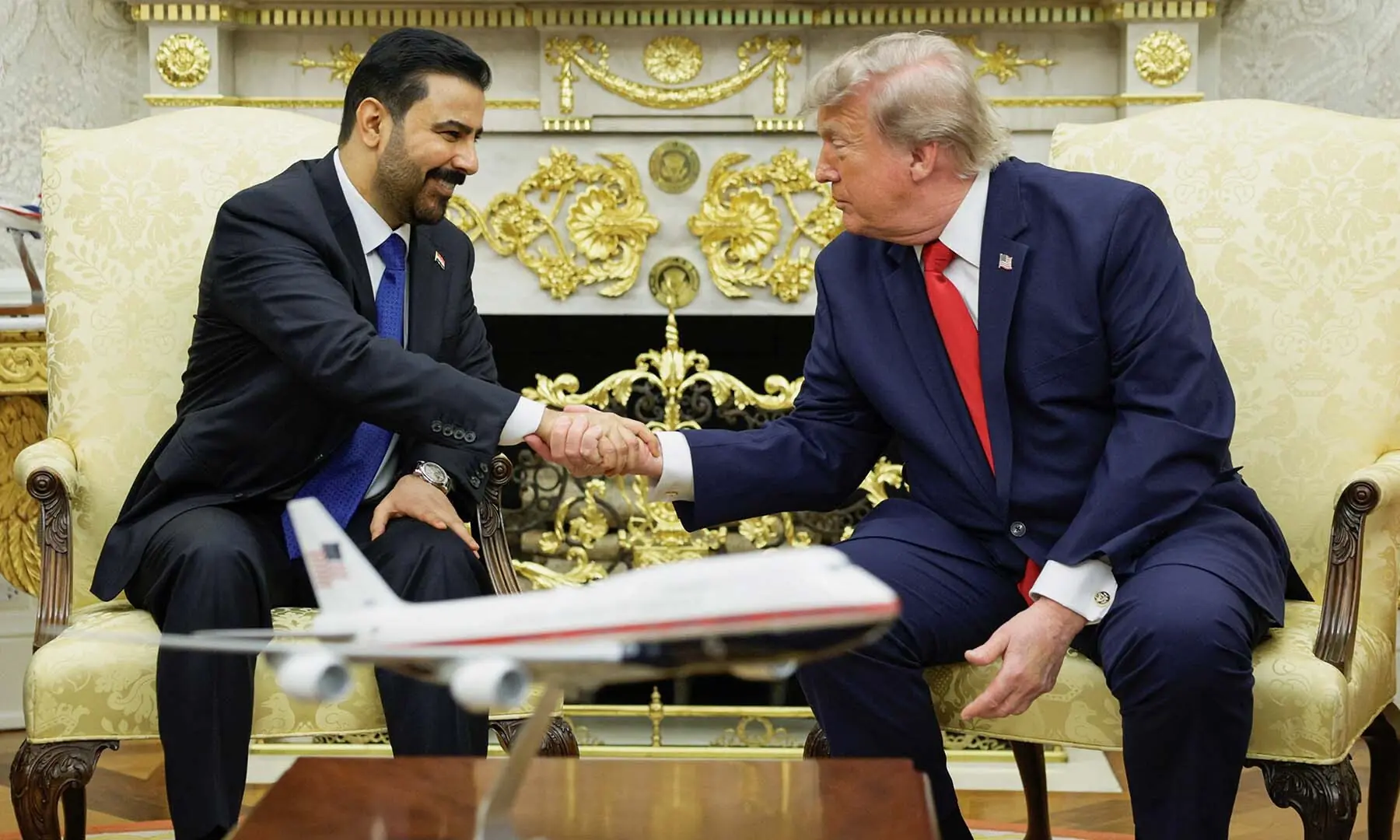 US President Donald Trump shakes hands with Iraqi Prime Minister Ali al-Zaidi as they participate in a bilateral meeting in the Oval Office at the White House in Washington, DC., the US on July 14, 2026. &mdash; Reuters