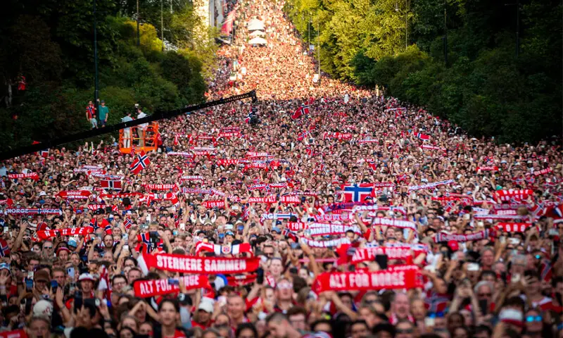 OSLO: Supporters welcome the Norway squad back home at Slottsplassen.&mdash;AFP