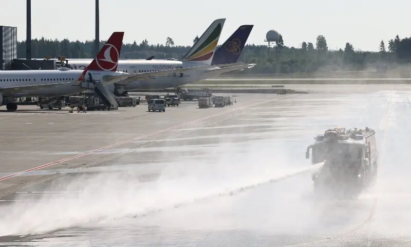 A vehicle from Oslo Airport's fire rescue services sprays water onto the runway at the airport, to combat heat, in Oslo, Norway on July 15, 2026. —Reuters A vehicle from Oslo Airport's fire rescue services sprays water onto the runway at the airport, to combat heat, in Oslo, Norway on July 15, 2026. —Reuters