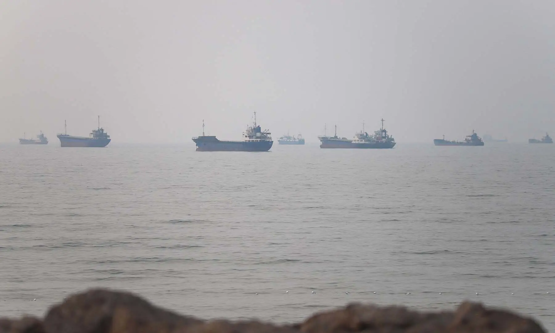 Vessels in the Strait of Hormuz are seen near the beach of Bandar Abbas, Iran on June 30, 2026. &mdash; Reuters/File