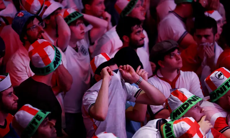England fans in London react after Argentina&rsquo;s Enzo Fernandez scores the equaliser.&mdash;Reuters