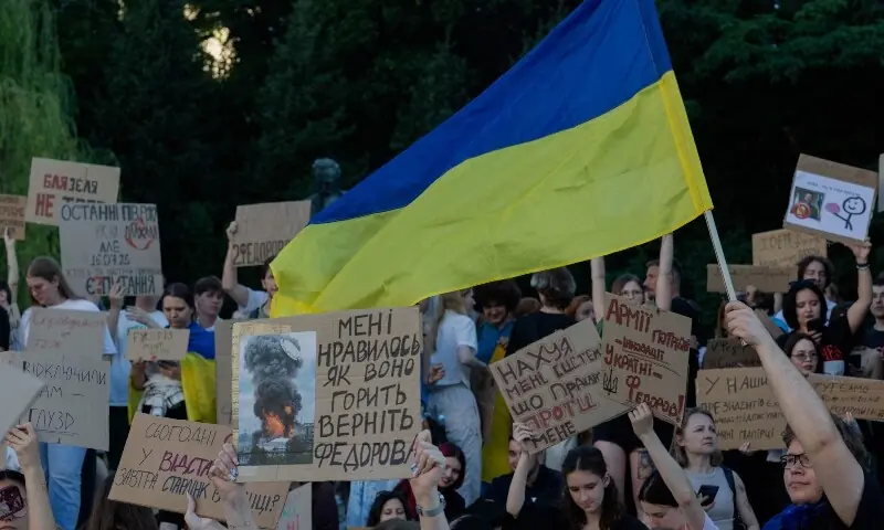 Protesters hold placards and chant slogans during a demonstration against Ukraine's President Volodymyr Zelensky's decision to dismiss Ukraine's Defence Minister Mykhailo Fedorov, in Kyiv on July 17, 2026, amid the Russian invasion of Ukraine. &mdash; AFP