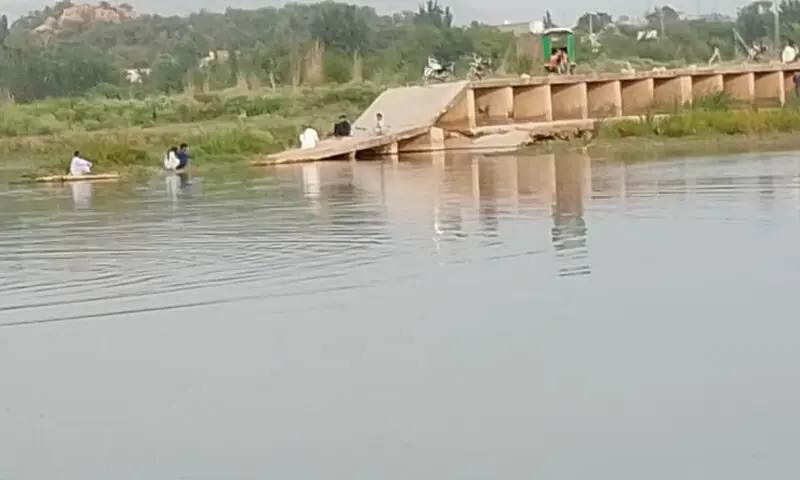 Recent rains wash away the makeshift bridge over Haro River near Hassanabdal. — Dawn Recent rains wash away the makeshift bridge over Haro River near Hassanabdal. — Dawn