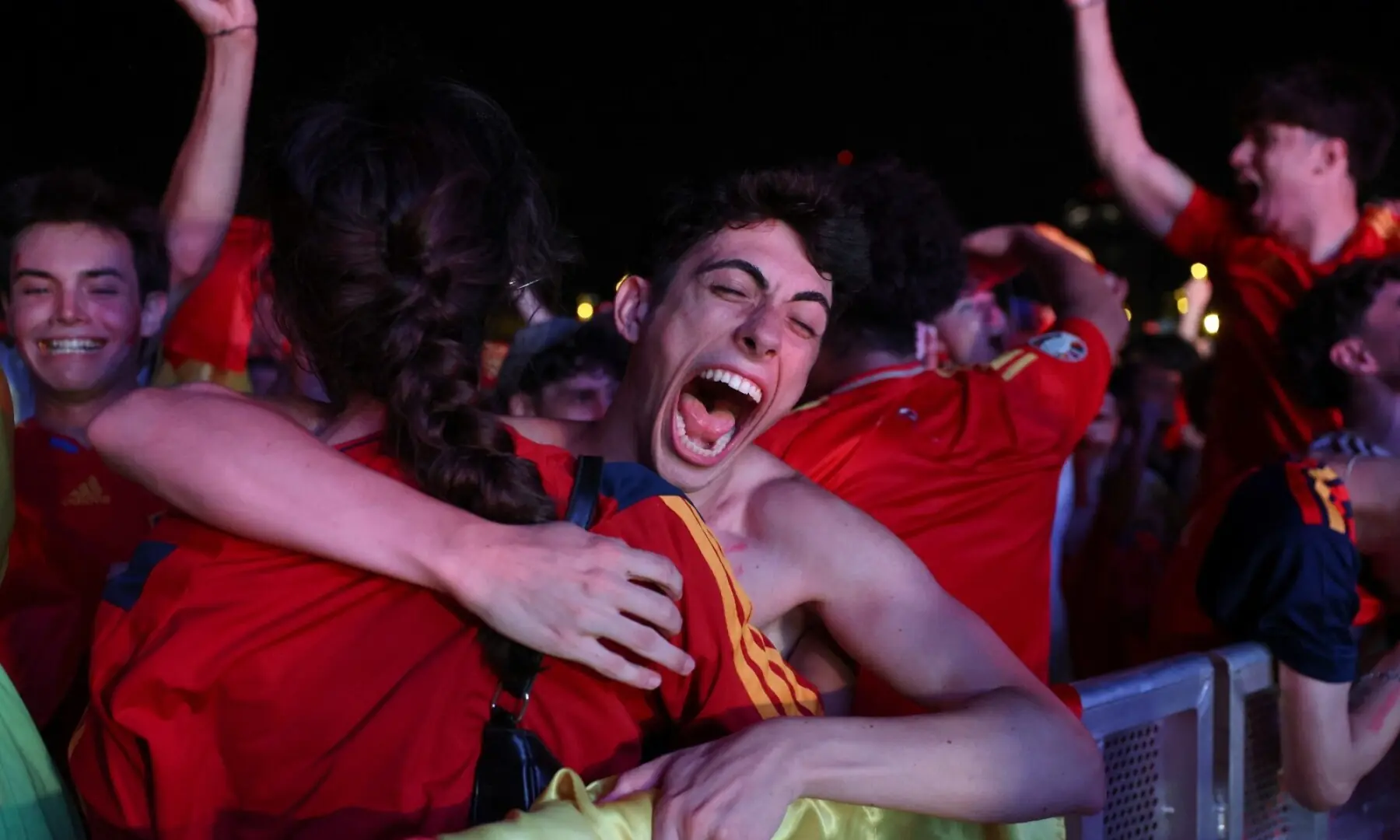 Spain supporters celebrate victory after the 2026 World Cup final match between Spain and Argentina displayed on a giant screen in the fan zone of the Forum&rsquo;s district of Barcelona, Spain on July 19, 2026. &mdash; AFP