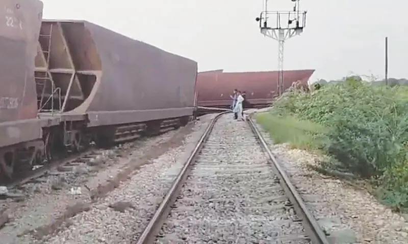 SOME of the 12 bogies derailed near Tando Adam on Sunday.—Umair Ali SOME of the 12 bogies derailed near Tando Adam on Sunday.—Umair Ali
