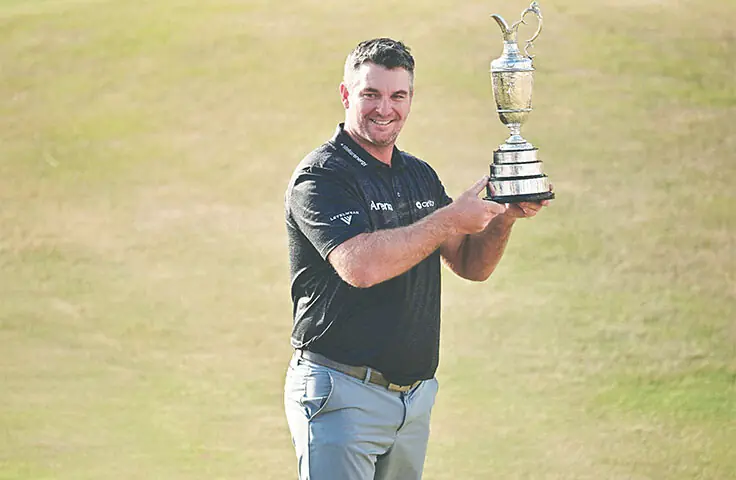 NEW ZEALAND’S Ryan Fox poses with the British Open trophy at the Royal Birkdale Golf Club on Sunday.—AFP NEW ZEALAND’S Ryan Fox poses with the British Open trophy at the Royal Birkdale Golf Club on Sunday.—AFP