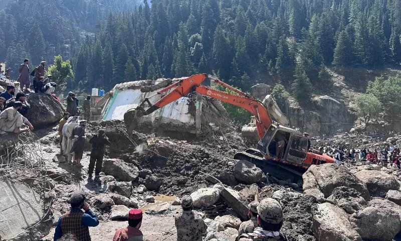 Afghan men clear the rubble of destroyed shops after flash floods hit Parun town in Afghanistan’s Nuristan province, on July 21, 2026. — AFP