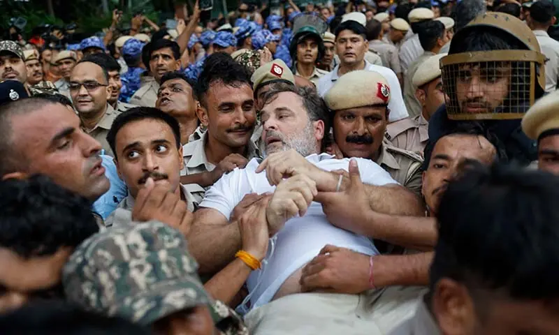Security personnel detain India's Opposition Leader Rahul Gandhi (C) as he stages a sit-in protest calling for Prime Minister Narendra Modi's resignation outside the latter's residence in New Delhi, India on July 21, 2026, a day after police crackdown against the protesting Cockroach Janta Party (CJP) supporters demanding the Education Minister Dharmendra Pradhan step down over alleged NEET examination irregularities. — AFP Security personnel detain India's Opposition Leader Rahul Gandhi (C) as he stages a sit-in protest calling for Prime Minister Narendra Modi's resignation outside the latter's residence in New Delhi, India on July 21, 2026, a day after police crackdown against the protesting Cockroach Janta Party (CJP) supporters demanding the Education Minister Dharmendra Pradhan step down over alleged NEET examination irregularities. — AFP