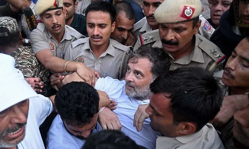 Security personnel detain India’s opposition leader Rahul Gandhi (C) as he stages a sit-in protest calling for Prime Minister Narendra Modi’s resignation outside the latter’s residence in New Delhi on July 21, 2026. — AFP