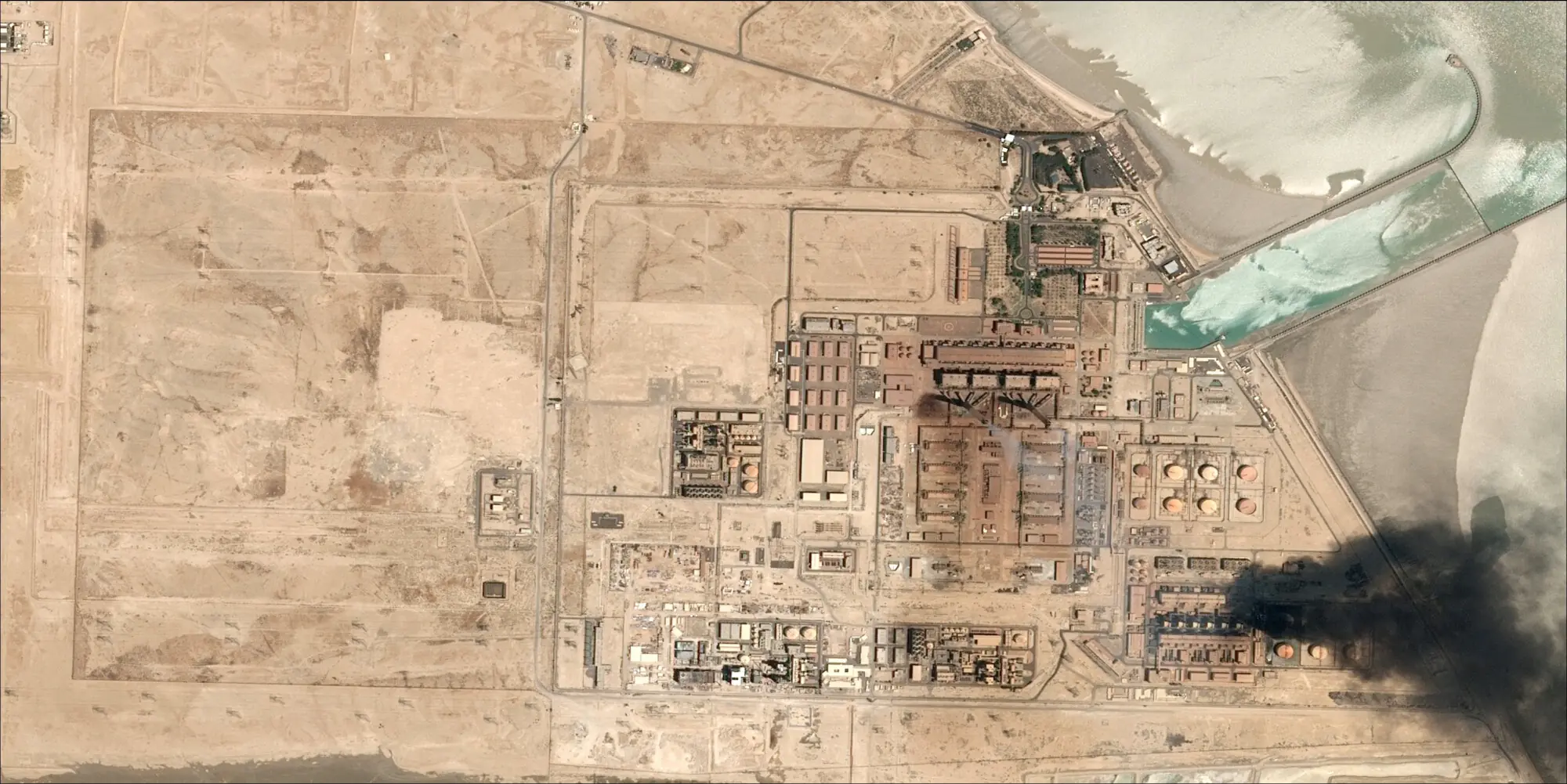 Satellite image shows smoke rising from Subiya Power and Water Desalination Plant, in Subiya, Kuwait, on July 18, 2026. &mdash; CNES 2026, Distribution Airbus DS via Reuters