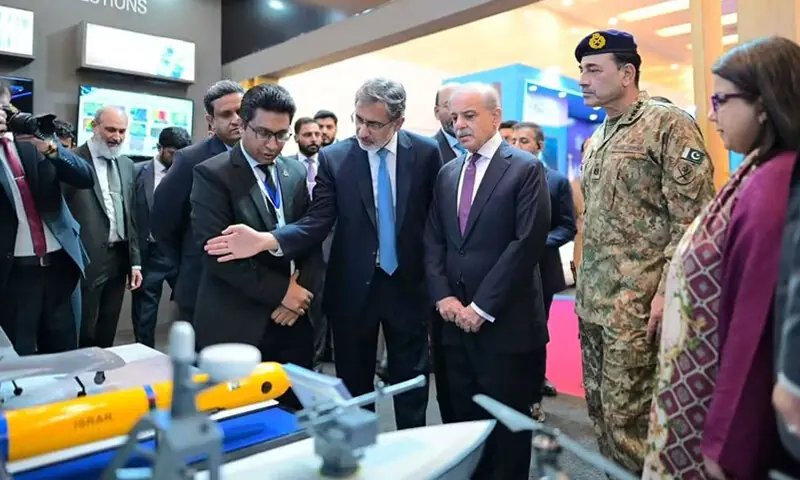 PM Shehbaz Sharif and Chief of Defence Forces Field Marshal Asim Munir being briefed about Pakistan&rsquo;s first indigenous autonomous underwater vehicle, ISRAR (Intelligence, Surveillance, Reconnaissance Autonomous Robot), at Indus RAS Expo at Pak-China Friendship Centre.&mdash;White Star