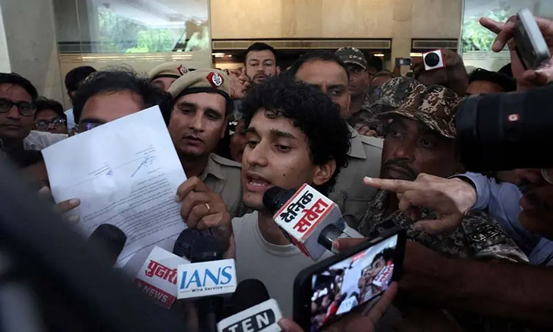 Saurav Das speaks as Ashutosh Ranka, both spokespersons for the Cockroach Janta Party (CJP), shows the demand letter to media after holding talks with JP Nadda, one of India’s senior federal ministers, outside the Constitution club in New Delhi, India on July 24, 2026. — Reuters
