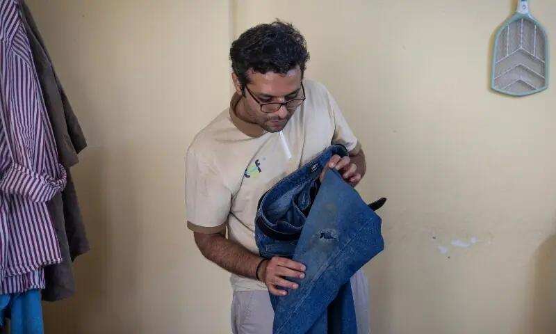 Dev Kotak, a reporter with the television channel Times Now, who was assaulted at the ongoing protest site of Cockroach Janata Party (CJP), shows his torn jeans inside his house in Noida, India, July 23, 2026. —Reuters/File Dev Kotak, a reporter with the television channel Times Now, who was assaulted at the ongoing protest site of Cockroach Janata Party (CJP), shows his torn jeans inside his house in Noida, India, July 23, 2026. —Reuters/File