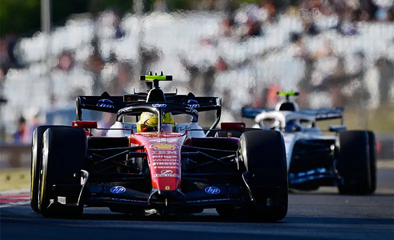 FERRARI’S British driver Lewis Hamilton drives during the Formula One Hungarian Grand Prix practice session at the Hungaroring racetrack on Friday.—Reuters FERRARI’S British driver Lewis Hamilton drives during the Formula One Hungarian Grand Prix practice session at the Hungaroring racetrack on Friday.—Reuters