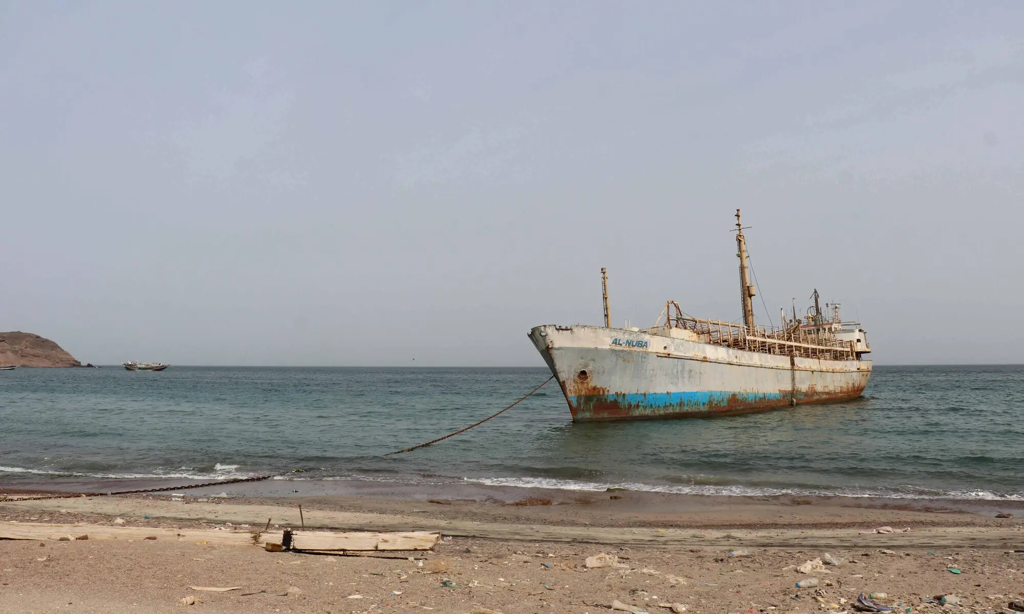 A photo taken from the Yemeni coast southwest of the city of Taiz, shows a vessel anchored at Bab al-Mandab Strait, in the Red Sea, on July 24, 2026. — AFP A photo taken from the Yemeni coast southwest of the city of Taiz, shows a vessel anchored at Bab al-Mandab Strait, in the Red Sea, on July 24, 2026. — AFP