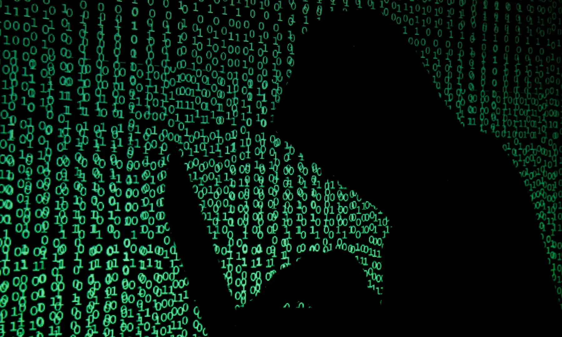 A hooded man holds a laptop computer as cyber code is projected on him in this illustration picture taken on May 13, 2017. — Reuters/Illustration/Fil A hooded man holds a laptop computer as cyber code is projected on him in this illustration picture taken on May 13, 2017. — Reuters/Illustration/Fil