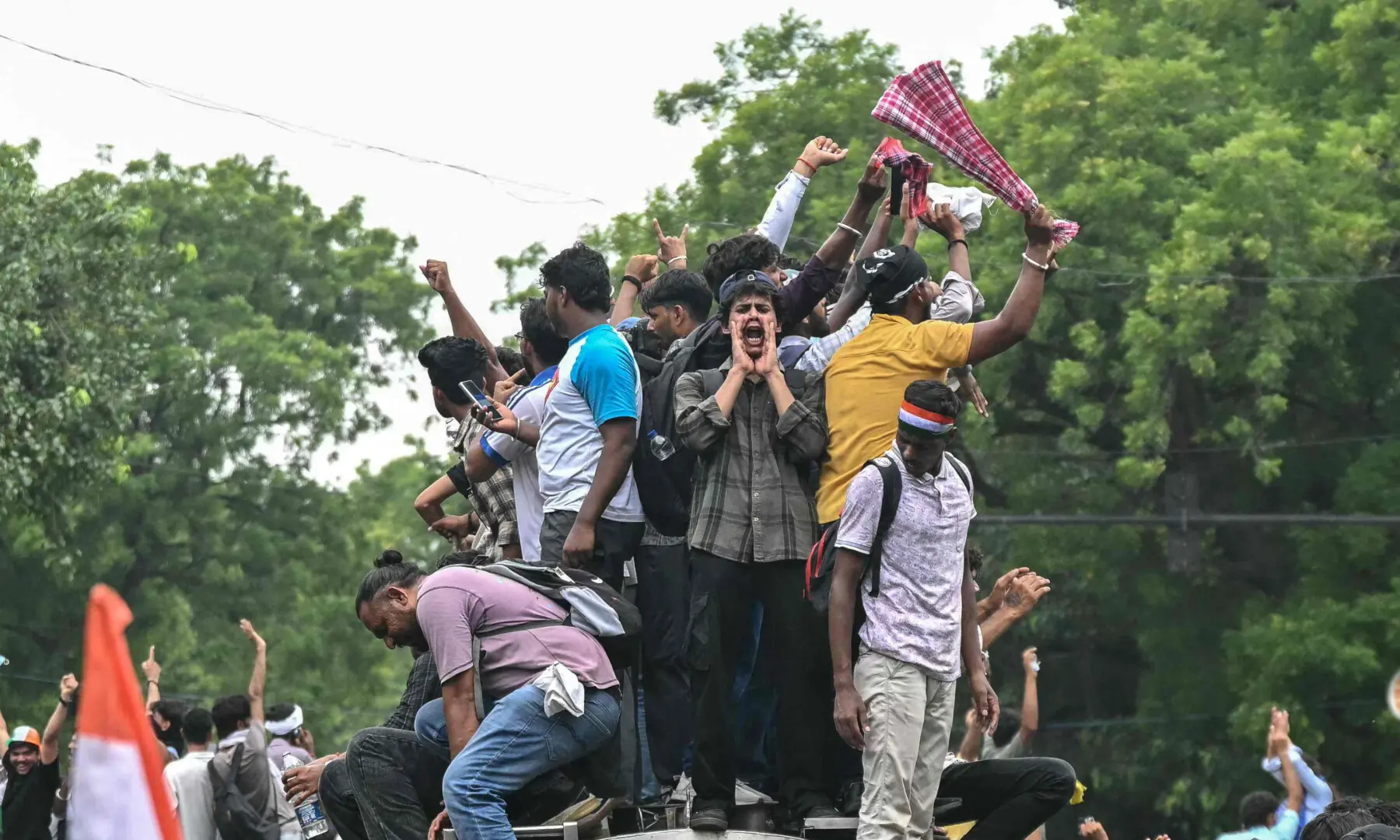  Cockroach Janta Party (CJP) supporters celebrate the resignation of India’s Education Minister Dharmendra Pradhan, at Jantar Mantar in New Delhi on July 25, 2026 amid the ongoing protests over alleged NEET exam irregularities. — AFP 