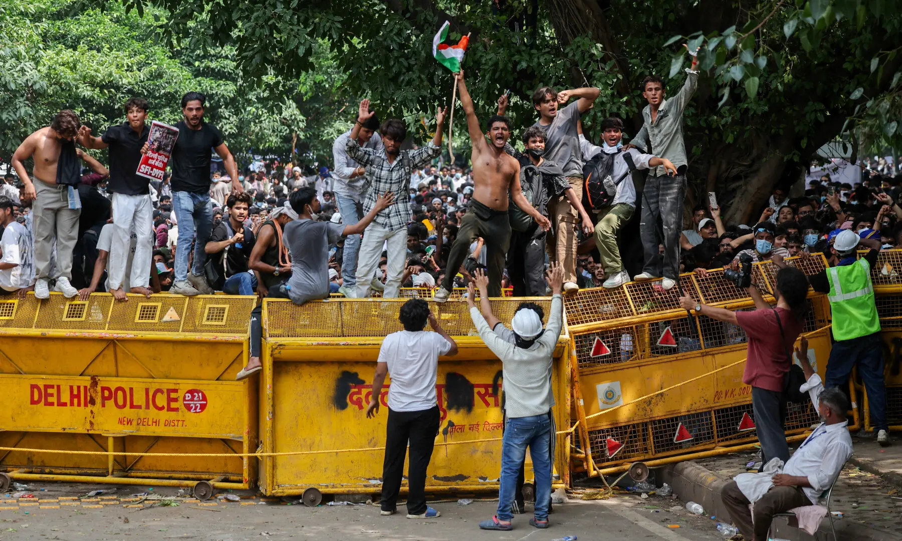  Supporters of India’s Cockroach Janta Party (CJP) celebrate after India’s Education Minister Dharmendra Pradhan resigned, at Jantar Mantar in New Delhi on July 25, 2026. — Reuters 