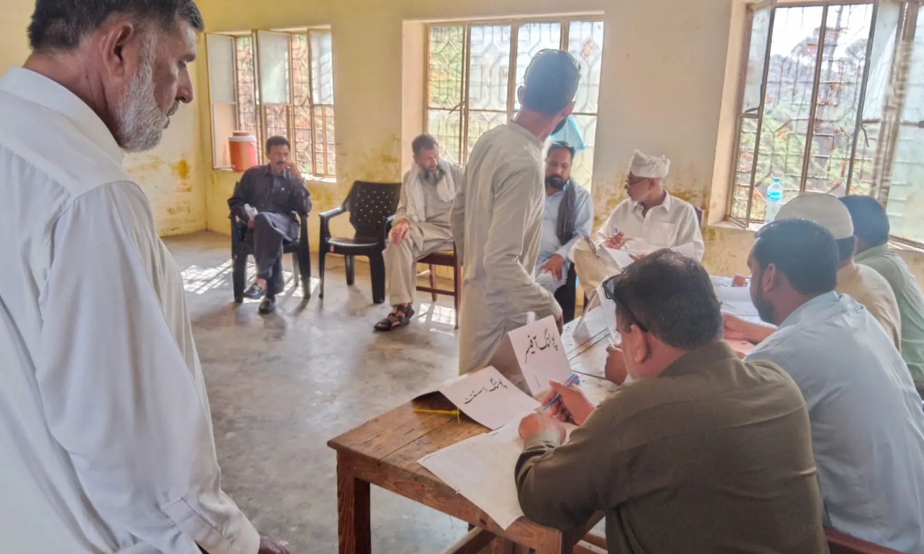 Voting under way at a polling station in Kot Jamil, Mirpur, Azad Jammu and Kashmir on July 27, in the first phase of general elections in AJK. — Photo provided by author