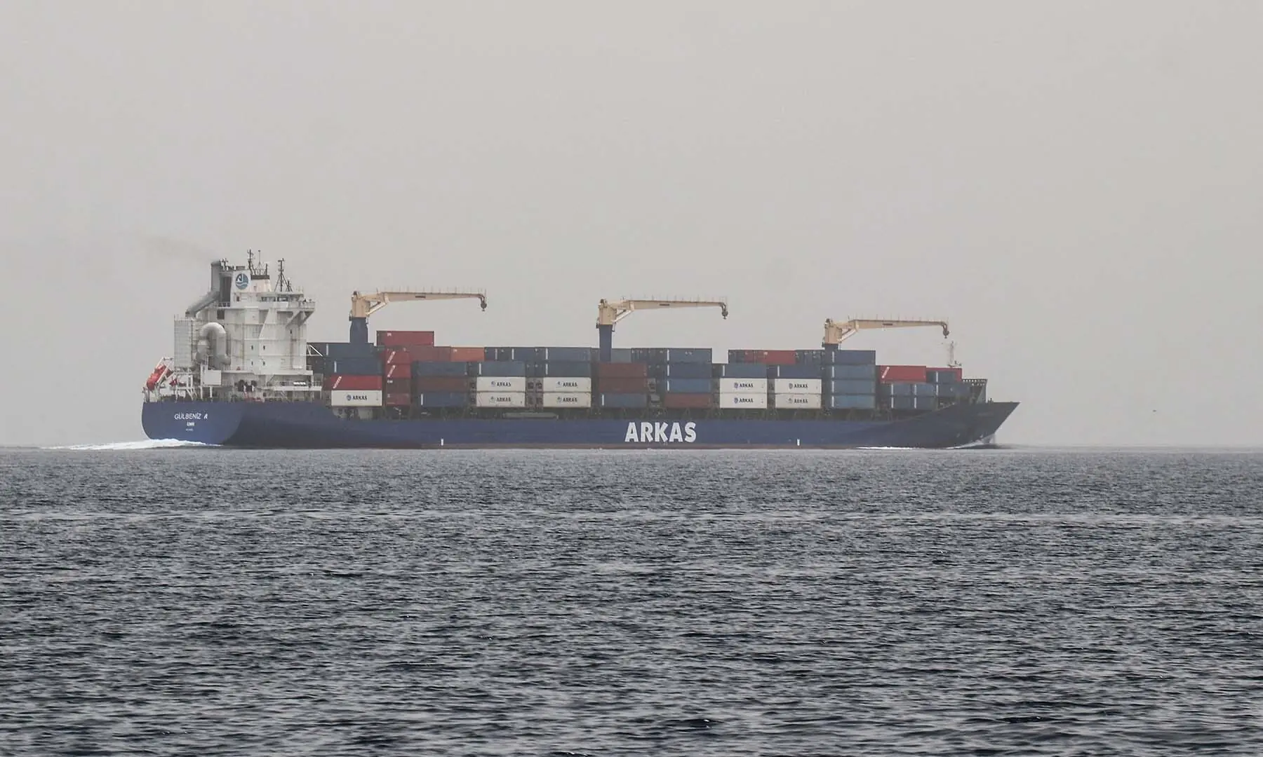 A commercial vessel passes through an international shipping lane off Yemen&rsquo;s Hanish Island in the Red Sea on July 27, 2026. &mdash; AFP