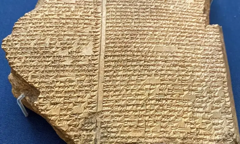 A baked clay fragment called the Flood Tablet dating to the 7th century BC, inscribed in cuneiform in the Akkadian language, presents the account of a great flood in the ancient Mesopotamian Epic of Gilgamesh, at the British Museum in London, Britain, September 2, 2022. &mdash; Reuters
