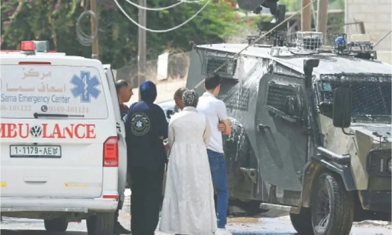 Israeli soldiers stop and inspect an ambulance during a raid in Jenin, in the occupied West Bank. &mdash; AFP/File