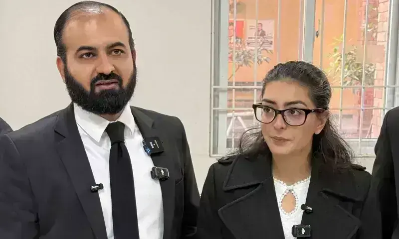 This picture taken on Dec 5, 2025 shows human rights lawyer Imaan Mazari (R) with her husband and fellow lawyer Hadi Ali Chattha (L), during a court hearing in Islamabad. &mdash; AFP/File