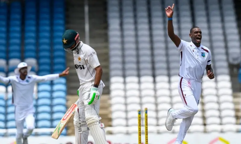Shan Masood (L) of Pakistan bowled by Justin Greaves (R) of West Indies during the 3rd day of 1st Test match between West Indies and Pakistan at Brian Lara Cricket Academy in Tarouba, Trinidad and Tobago on July 27, 2026. &mdash; AFP