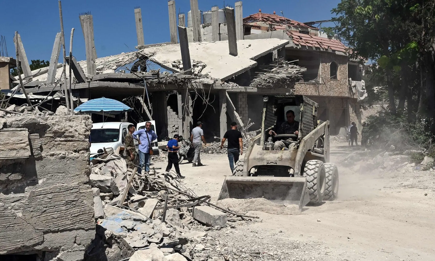 An army bulldozer clears rubble from a street in Zawtar al-Gharbiya on July 28, 2026, after the Lebanese forces deployed to the southern village last week as part of a framework deal reached with Israel. &mdash; AFP