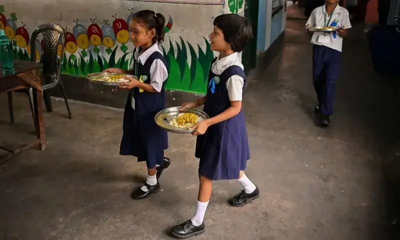 Students return to their classroom after receiving mid-day meals at a government primary school in Kolkata on July 9, 2026. —AFP/File Students return to their classroom after receiving mid-day meals at a government primary school in Kolkata on July 9, 2026. —AFP/File