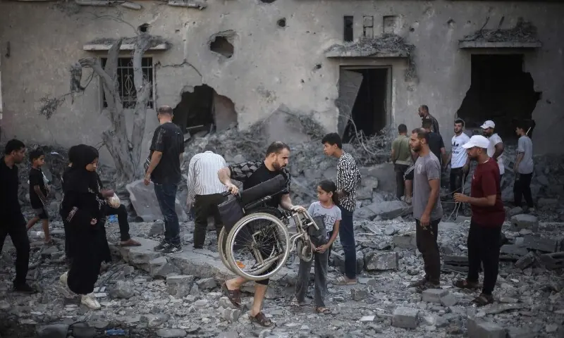 Palestinians inspect damaged and destroyed buildings after they were targeted by Israeli strikes the previous night following warnings to evacuate in Deir al-Balah, central Gaza Strip on July 29, 2026. — AFP Palestinians inspect damaged and destroyed buildings after they were targeted by Israeli strikes the previous night following warnings to evacuate in Deir al-Balah, central Gaza Strip on July 29, 2026. — AFP