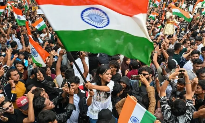 Cockroach Janta Party supporters waving national flags in Mumbai on July 26, a day after the resignation of India's Education Minister Dharmendra Pradhan. &mdash; AFP