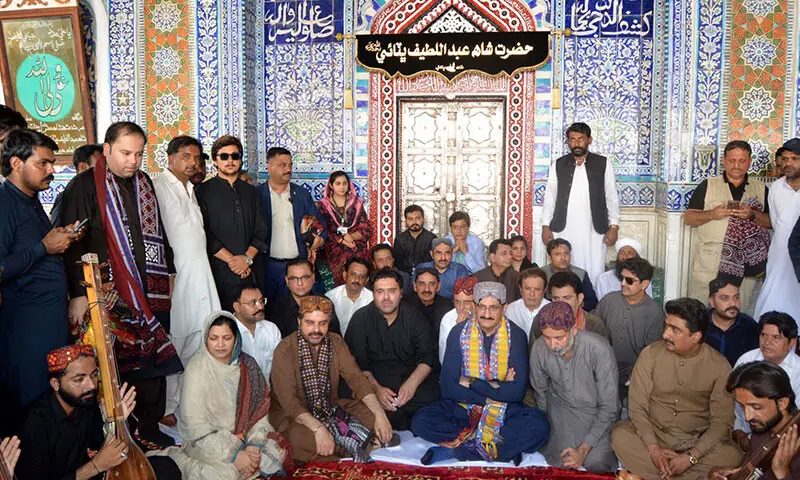 Sindh Chief Minister Syed Murad Ali Shah listens to the Sufi music at the shrine of Hazrat Shah Abdul Latif Bhitai.—Umair Ali Sindh Chief Minister Syed Murad Ali Shah listens to the Sufi music at the shrine of Hazrat Shah Abdul Latif Bhitai.—Umair Ali