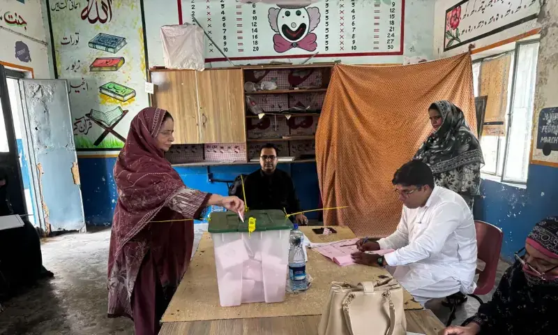 A woman casts her vote at a polling station in AJK's Mirpur Division on July 27, 2026. — photo via Tariq Naqash/File A woman casts her vote at a polling station in AJK's Mirpur Division on July 27, 2026. — photo via Tariq Naqash/File