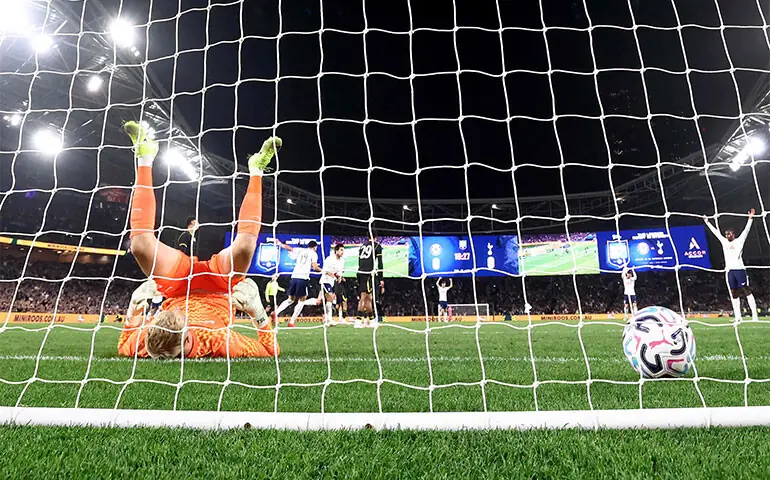 TOTTENHAM Hotspur&rsquo;s Sandro Tonali (third L) celebrates after scoring past Chelsea goalkeeper Teddy Sharman-Lowe during their Sydney Super Cup match at the Stadium Australia on Saturday.&mdash;AFP
