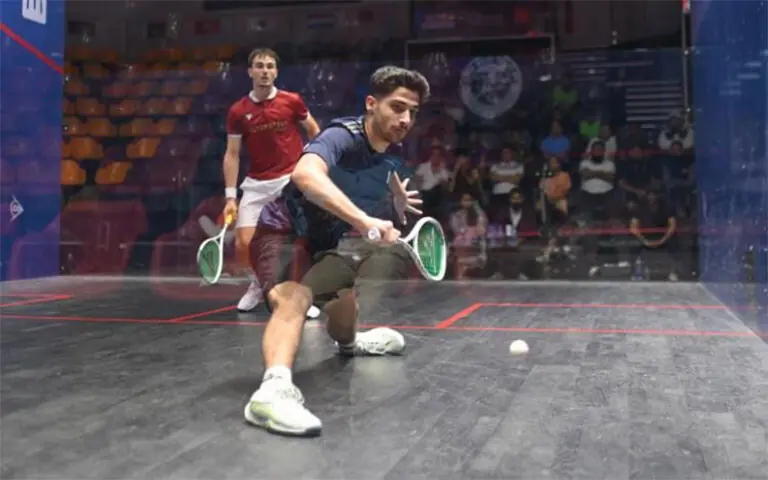PAKISTAN&rsquo;S Hamza Khan (front) in action against David Bernet of Switzerland during their pre-quarterfinal of the PN Fleet Club Open International Squash Championship at the Roshan Khan-Jahangir Khan Squash Complex on Saturday.