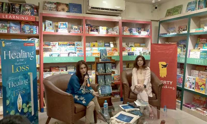 Author Saira Sheikh (left) in conversation with Kamila Rahim Habib during the book launch at Liberty Books in Karachi on July 31. &mdash; Photo by Shazia Hasan