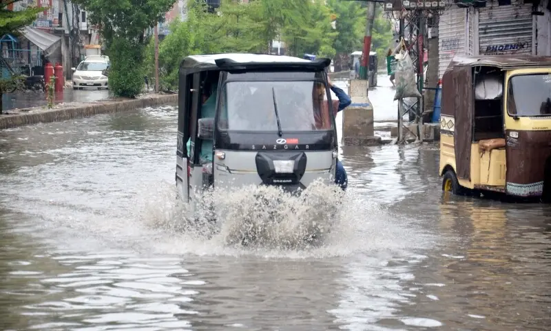  A view of Hyder Chowk during rain on Sunday,. &mdash; Photo by Umair Ali