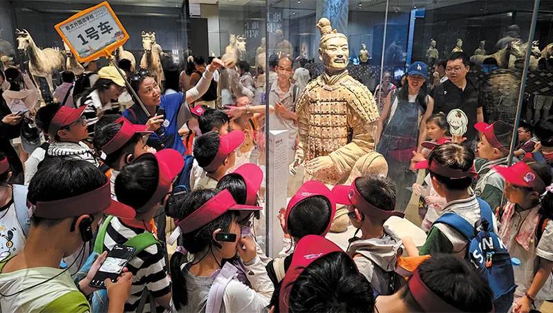 XI&rsquo;AN: Students on a study trip use AI and other digital technologies at Emperor Qinshihuang&rsquo;s Mausoleum Site Museum.&mdash;Courtesy China Daily