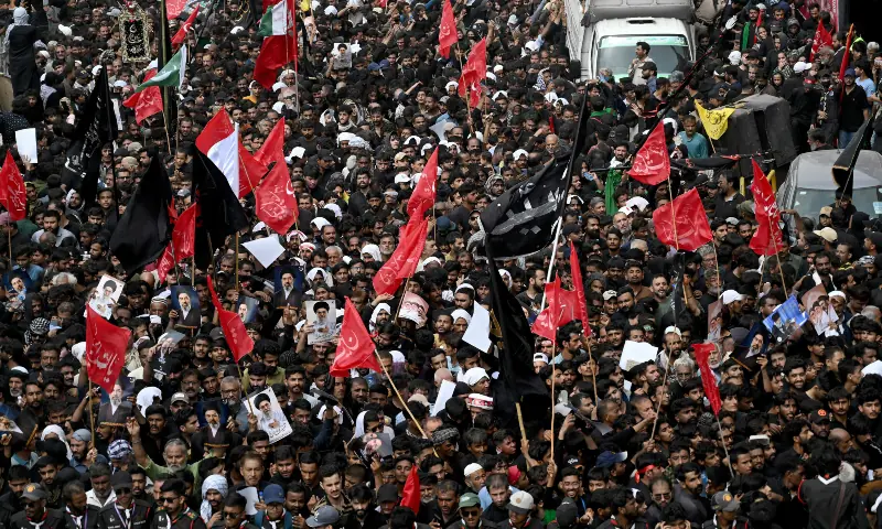 Shia Muslim devotees take part in the religious Chehlum procession in Karachi on August 4, 2026. — AFP
