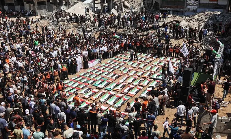 Palestinian mourners attend the funeral of members of the Abu Sharia and Al-Hasayna families, whose remains were recently recovered from the rubble of residential buildings in the al-Sabra neighbourhood, which were struck by Israeli bombardments in November 2023, in Gaza City on August 4, 2026. — AFP Palestinian mourners attend the funeral of members of the Abu Sharia and Al-Hasayna families, whose remains were recently recovered from the rubble of residential buildings in the al-Sabra neighbourhood, which were struck by Israeli bombardments in November 2023, in Gaza City on August 4, 2026. — AFP