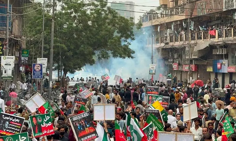 PTI demonstrators face tear gas as they protest in Karachi&rsquo;s Saddar Town area on August 5, 2026. &mdash;  Photo courtesy PTI
