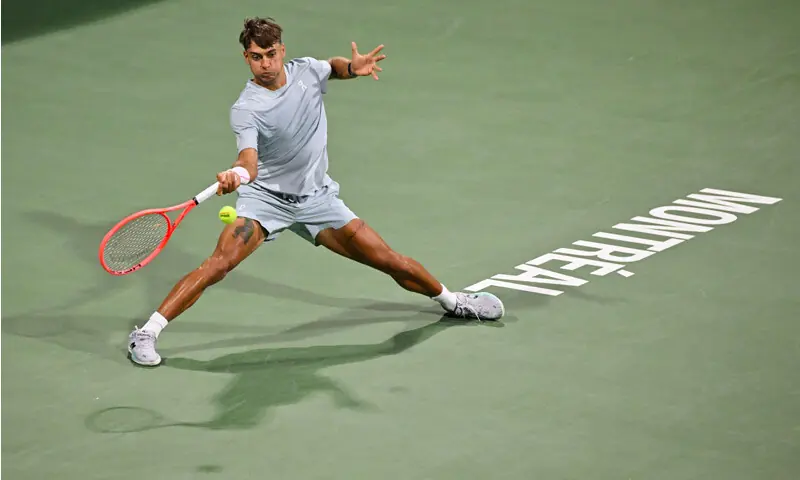 MONTREAL: Flavio Cobolli of Italy plays a forehand against Germany’s Yannick Hanfmann during their Montreal Masters second-round match at Stade IGA.—AFP MONTREAL: Flavio Cobolli of Italy plays a forehand against Germany’s Yannick Hanfmann during their Montreal Masters second-round match at Stade IGA.—AFP