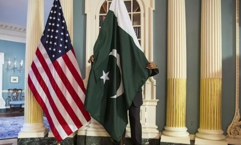 In this February 9, 2015 photo, a State Department contractor adjusts a Pakistan national flag before a meeting between then US secretary of state John Kerry and Pakistan's erstwhile interior minister Chaudhry Nisar Ali Khan on the sidelines of the White House Summit on Countering Violent Extremism at the State Department in Washington. — Reuters/File In this February 9, 2015 photo, a State Department contractor adjusts a Pakistan national flag before a meeting between then US secretary of state John Kerry and Pakistan's erstwhile interior minister Chaudhry Nisar Ali Khan on the sidelines of the White House Summit on Countering Violent Extremism at the State Department in Washington. — Reuters/File