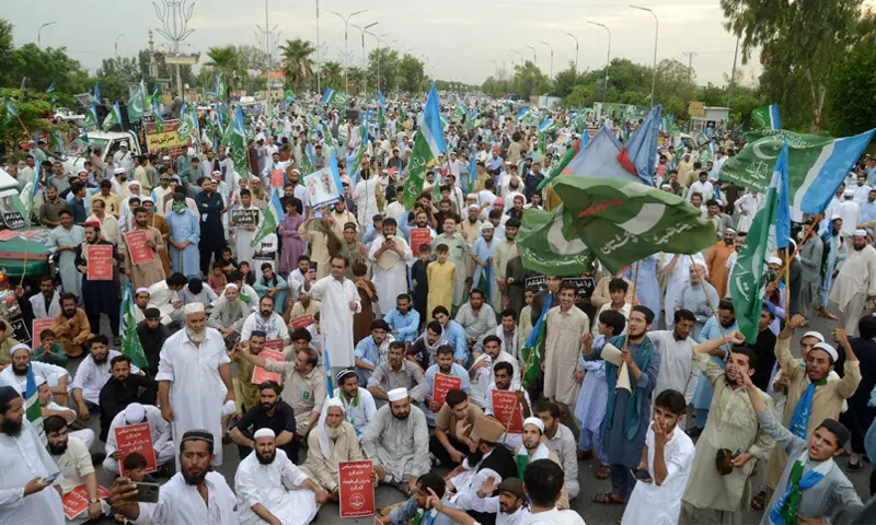 Jamaat-i-Islami workers stage a sit-in at Peshawar-Islamabad Motorway toll plaza on Friday against increase in prices of petroleum products, petroleum levy, inflation and unemployment. &mdash; White Star