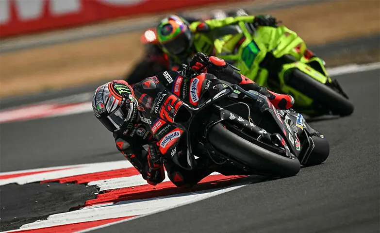 SILVERSTONE: Aprilia Racing’s Marco Bezzecchi of Italy takes part in practice for the MotoGP British Grand Prix at the Silverstone circuit on Friday.—AFP SILVERSTONE: Aprilia Racing’s Marco Bezzecchi of Italy takes part in practice for the MotoGP British Grand Prix at the Silverstone circuit on Friday.—AFP