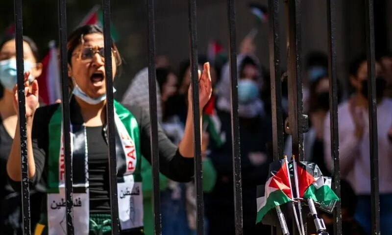 Palestinian flags are placed on a locked fence while students demonstrate outside Columbia University campus, as protests continue inside and outside the university during the ongoing conflict between Israel and Hamas, in New York City on April 22. &mdash; Reuters/File