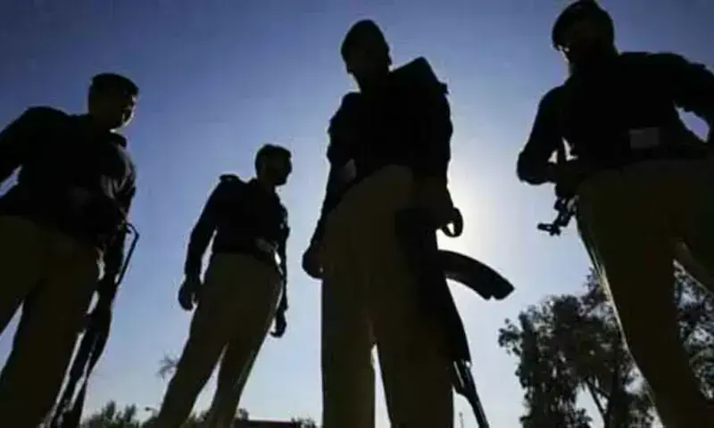 Image showing the silhouettes of policemen in Pakistan. — AFP/File Image showing the silhouettes of policemen in Pakistan. — AFP/File