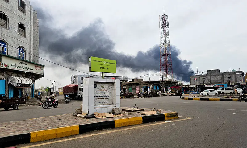 Smoke rises during Houthi missile and drone strikes on the Red Sea port city of Mokha, Yemen.—Reuters Smoke rises during Houthi missile and drone strikes on the Red Sea port city of Mokha, Yemen.—Reuters