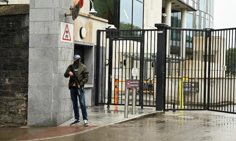 A member of the Garda stands outside the Special Criminal Court where alleged Irish crime gang boss Daniel Kinahan is due to appear on charges of organised criminal activity after being extradited to Ireland from the United Arab Emirates (UAE), in Dublin, Ireland, August 9, 2026. — Reuters A member of the Garda stands outside the Special Criminal Court where alleged Irish crime gang boss Daniel Kinahan is due to appear on charges of organised criminal activity after being extradited to Ireland from the United Arab Emirates (UAE), in Dublin, Ireland, August 9, 2026. — Reuters